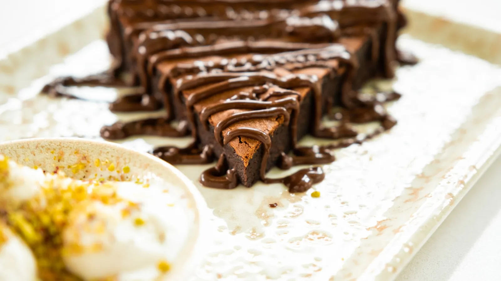 Slices of no-bake chocolate cake with a chocolate topping